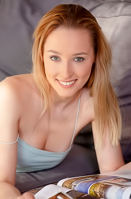 Kelly Collins Pulls Down Her Panties To Reveal The Neat Triangle Of Hair
